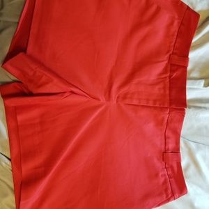 Shorts, coral in color